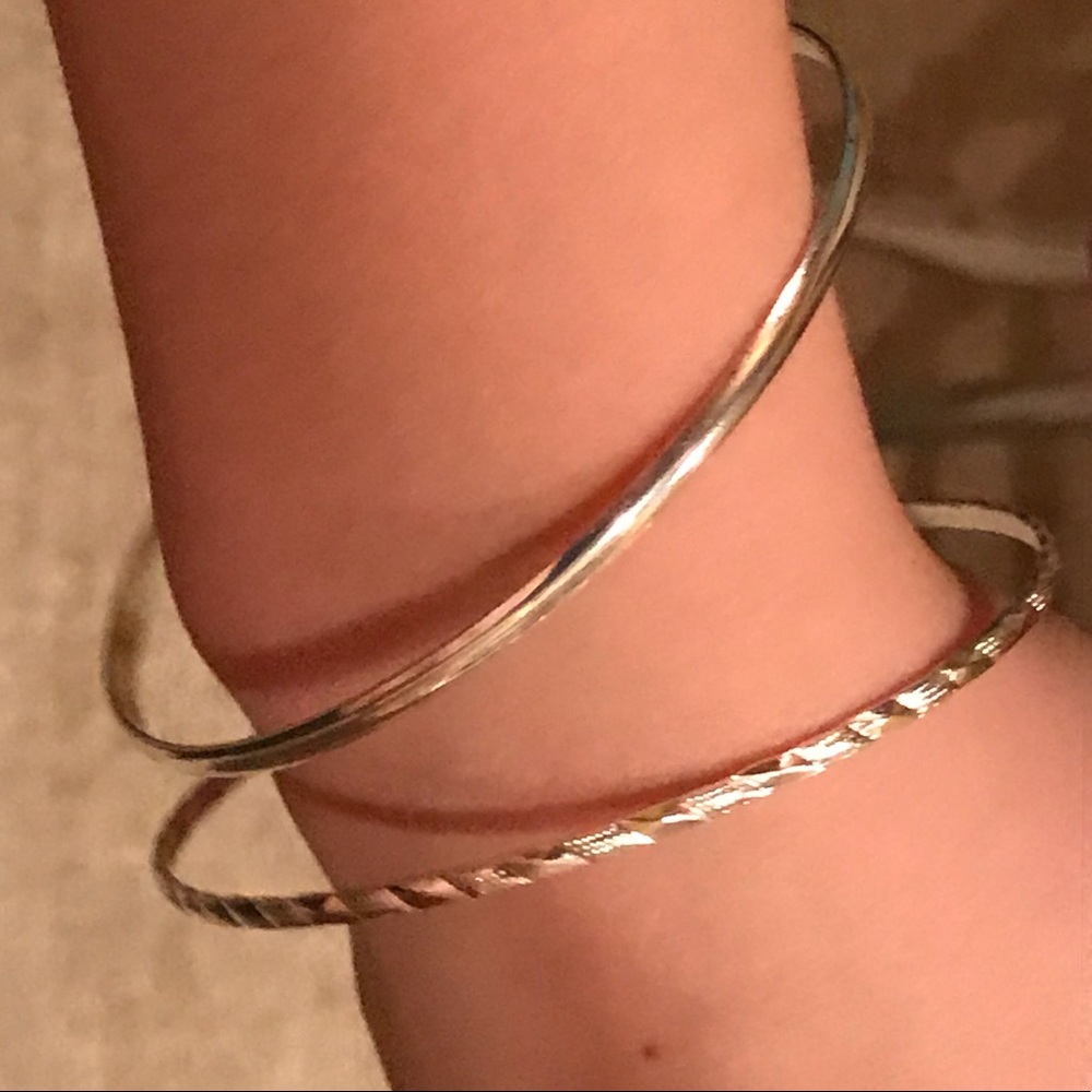 Silver bangles.